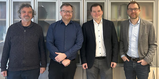 Malte Mues with Heinrich Müller, Ben Hermann and Falk Howar after defending his doctoral dissertation